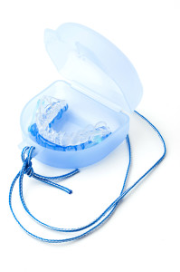 A mouthguard for snoring moves the jaw to help separate tissue that vibrates when air is taken in or expelled. 